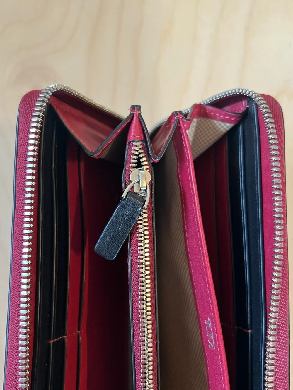 Tumi Red Leather Zip-Around Wallet with Black Trim